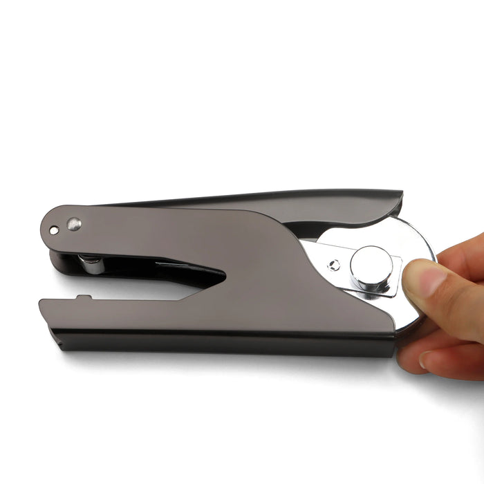 Remove the clip plate from the end of the embosser press.