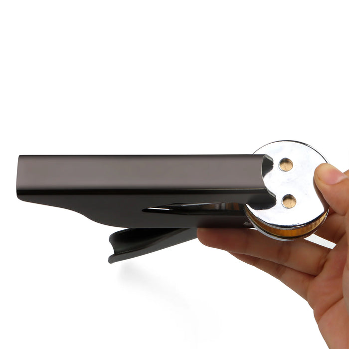 Remove the clip plate from the end of the embosser press.
