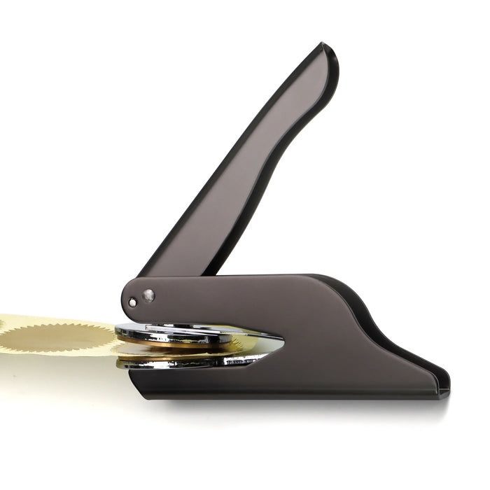 Remove the clip plate from the end of the embosser press.